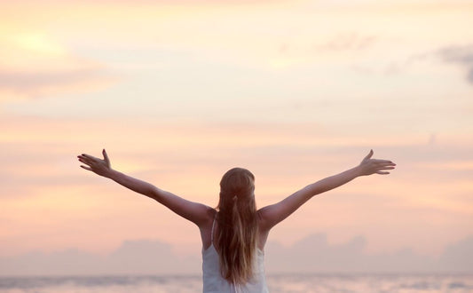 A woman evokes a sense of freedom and joy